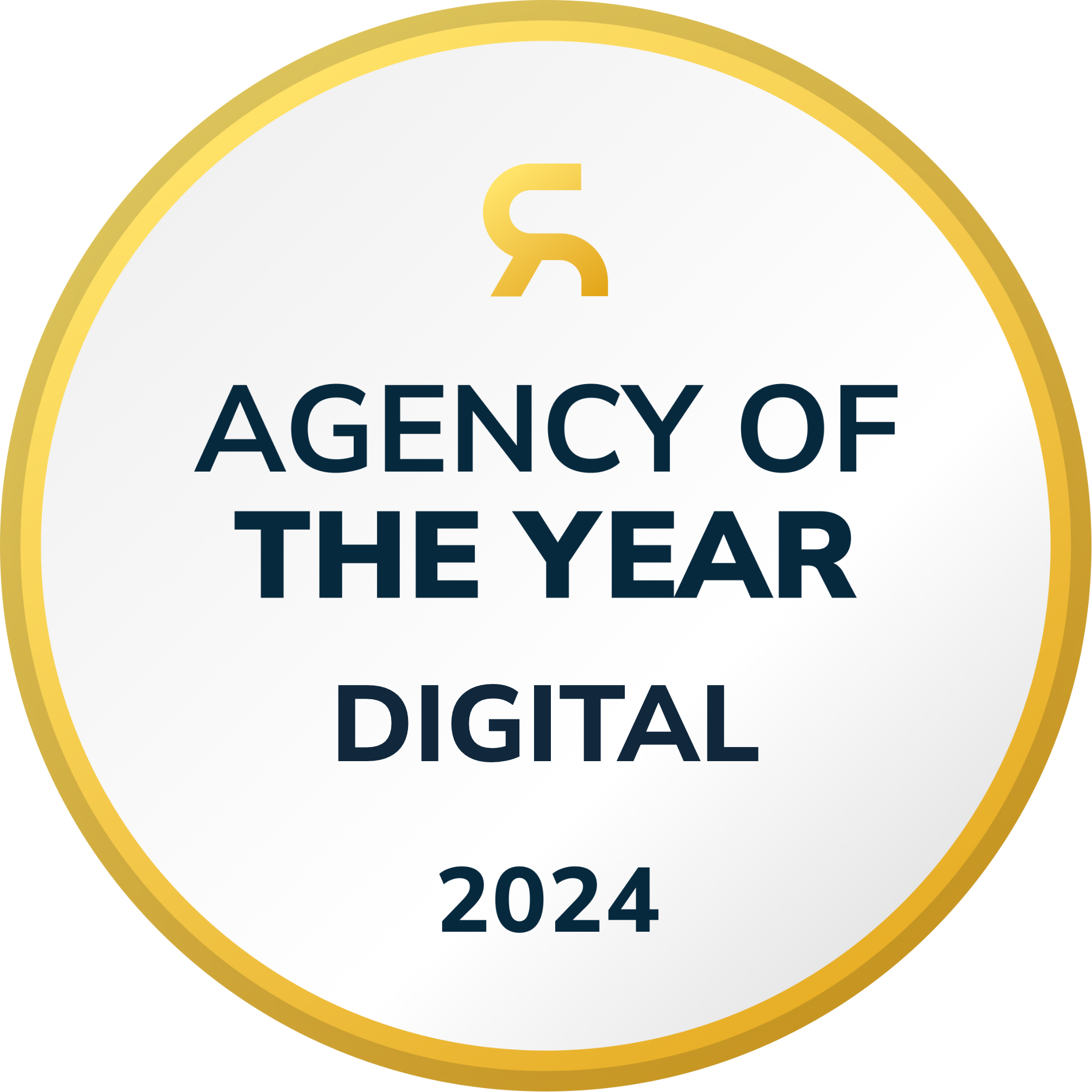 Badge with gold border reading 'Agency of the Year Digital 2024' and a stylized gold R symbol above the text.